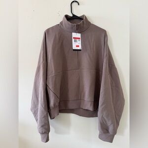 Nike Women's 24.7 ImpossiblySoft Oversized 1/2 Zip Sweatshirt